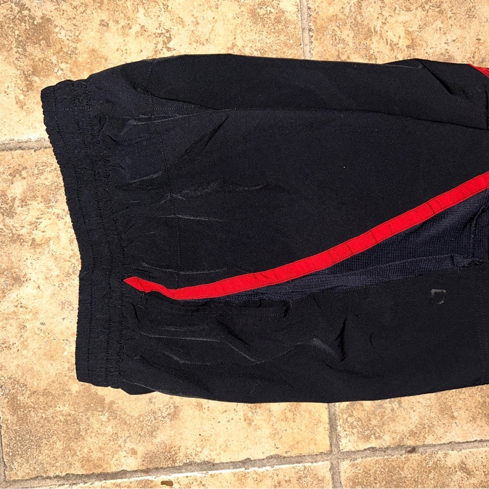 Black Shorts with Red Stripe